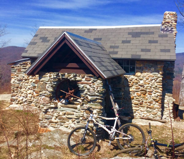 Proof we made it to the top: our bikes at the stone summit cabin