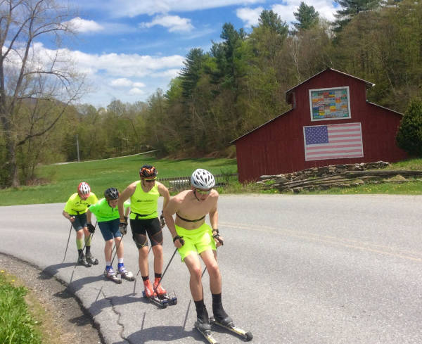 The final barn, featuring a flag, some license plates, and Will, Glueck, Tim, and Charlie
