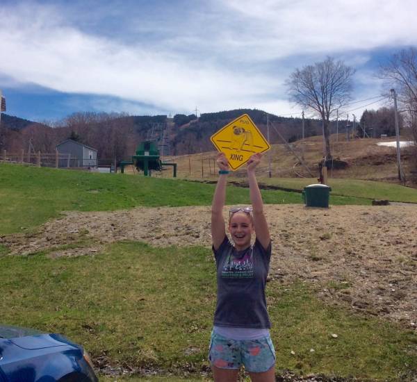 Eliza helping display one of the new pug signs at Bolton!