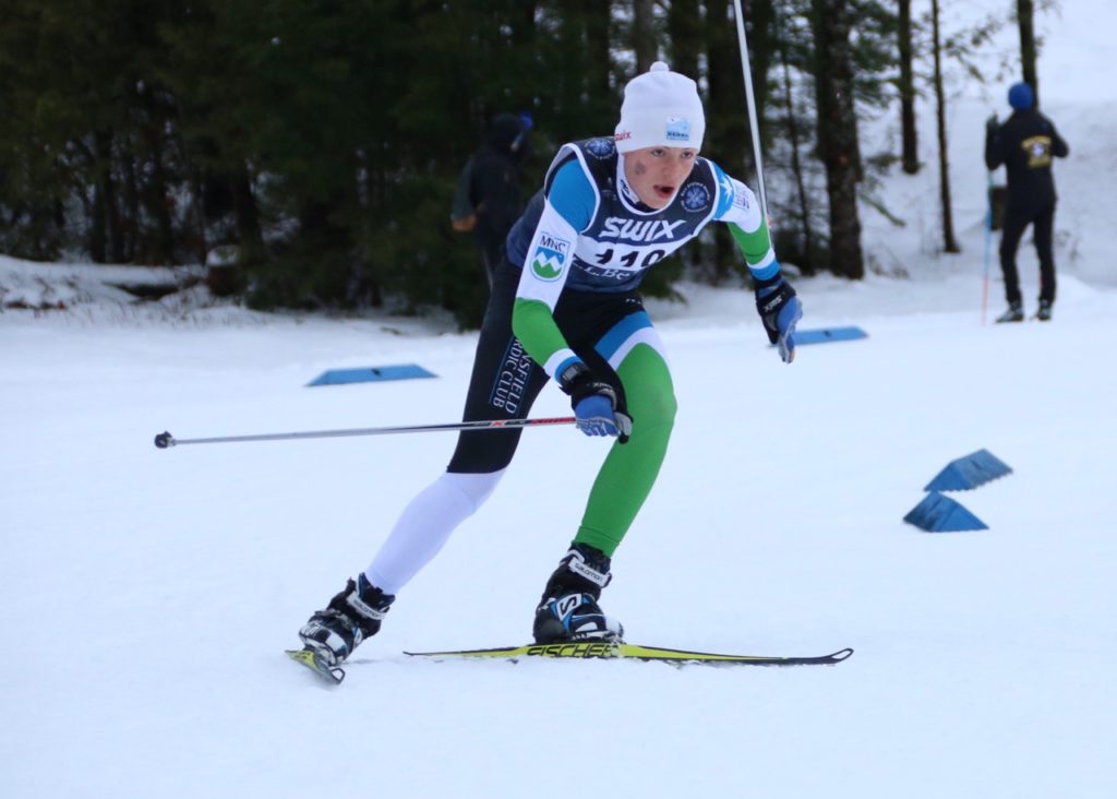 Photogenic skate skier Aidan Burt taking Jake Hollenbach's skis out for a rip to 8th place (5th American) in the U16 pursuit